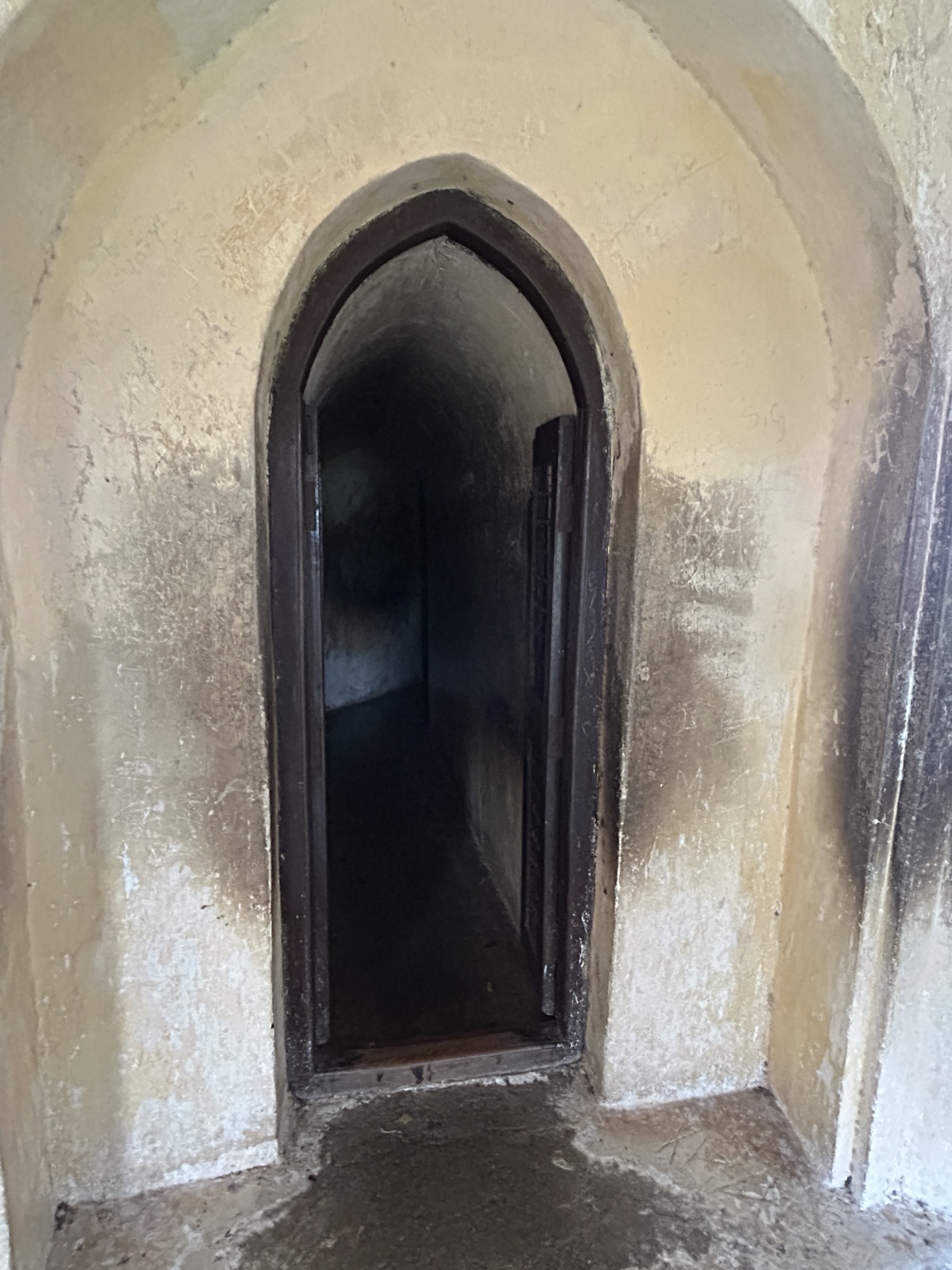 an arched gateway to the stairs